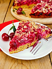 Image showing Pie cherry with red napkin on board