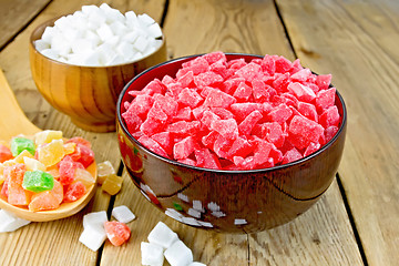 Image showing Candied red and white in bowl on board