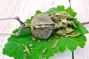 Image showing Sage dried in strainer on board