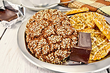 Image showing Cookies chocolate and shortbread with sesame on metal tray