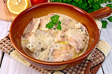 Image showing Fish stew in sauce on ceramic pan