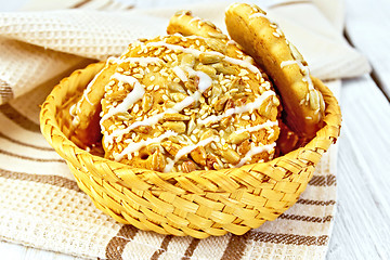 Image showing Cookies with sesame and sunflower in wicker bowl