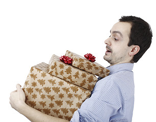 Image showing Young man holding a present