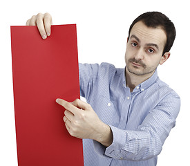 Image showing Man holding a paper