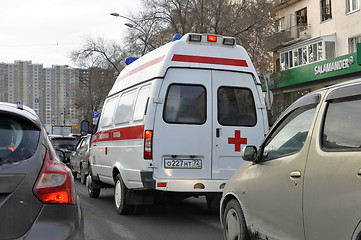 Image showing The ambulance car gets stuck in a traffic jam. Tyumen, Russia