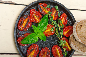 Image showing baked cherry tomatoes with basil and thyme