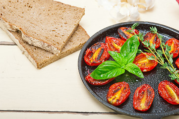 Image showing baked cherry tomatoes with basil and thyme