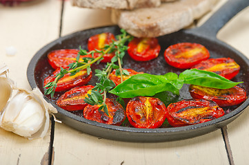 Image showing baked cherry tomatoes with basil and thyme