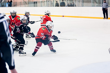 Image showing Game moment of children ice-hockey teams
