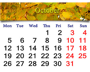 Image showing calendar for October of 2015 with yellow leaves