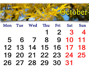 Image showing calendar for October of 2015 with yellow leaves