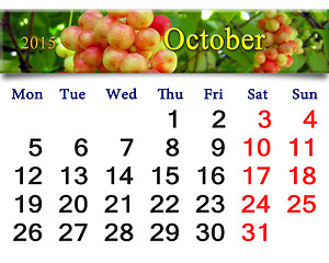 Image showing calendar for October of 2015 with red schisandra