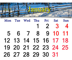 Image showing calendar for January of 2015 with snowy village