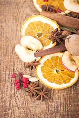 Image showing Christmas spices and dried orange sliceson 