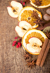 Image showing Christmas spices and dried orange sliceson 