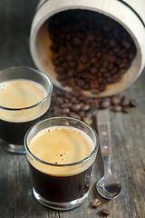 Image showing two cups of coffee and coffee beans