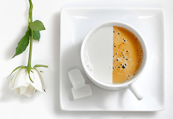 Image showing half coffee half milk cup of coffee