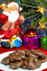 Image showing Santa Claus with German Christmas cakes Lebkuchen