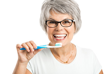 Image showing Brushing teeth