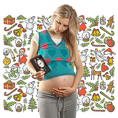 Image showing Pregnant Woman Looking For Christmas Gifts