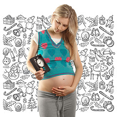 Image showing Pregnant Woman Looking For Christmas Gifts