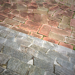 Image showing Tiled square and stone steps