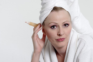 Image showing Pretty lady in bathrobe and towel