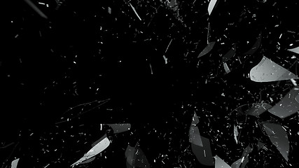 Image showing Breaking and Shattered glass on black