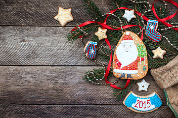 Image showing Christmas Santa Claus and New Year star cookies in rustic style