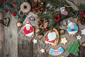 Image showing Christmas pastry and decorated cookies in rustic style