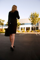 Image showing Business professional walking to the office