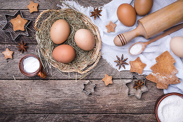 Image showing Christmas homemade cookies and ingredients in rustic style