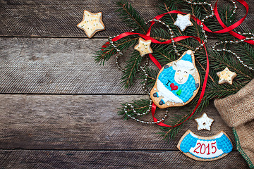 Image showing Xmas and New Year 2015 sheep cookie and pastry on wood