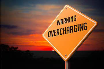 Image showing Overcharging on Warning Road Sign.