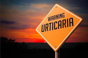 Image showing Urticaria on Warning Road Sign.