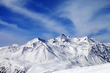 Image showing Winter snowy mountains in windy day