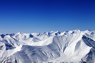 Image showing Winter snowy mountains with avalanche slope