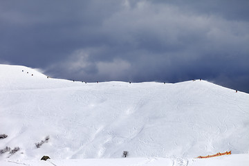 Image showing Off-piste slope and gray sky in bad weather day