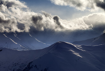 Image showing Evening mountain and sunlight clouds