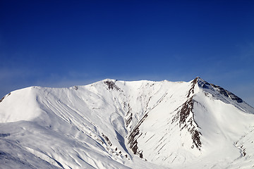 Image showing Snowy mountains in wind day