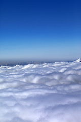 Image showing Mountains under clouds in nice winter morning