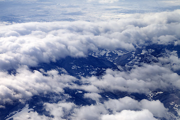 Image showing Top view on fields and hills in mist