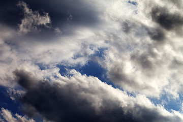 Image showing Blue sky with dark clouds