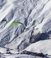 Image showing Speed flying in mountains at sun day