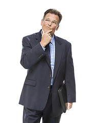 Image showing Businessman With Hand on Chin and Looking Up and Over