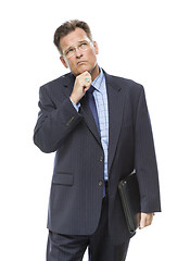 Image showing Businessman With Hand on Chin and Looking Up and Over