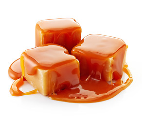 Image showing caramel candies and caramel sauce