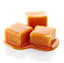 Image showing caramel candies and caramel sauce