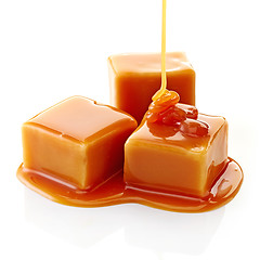 Image showing caramel candies and caramel sauce