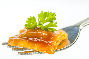 Image showing Ravioli with fork